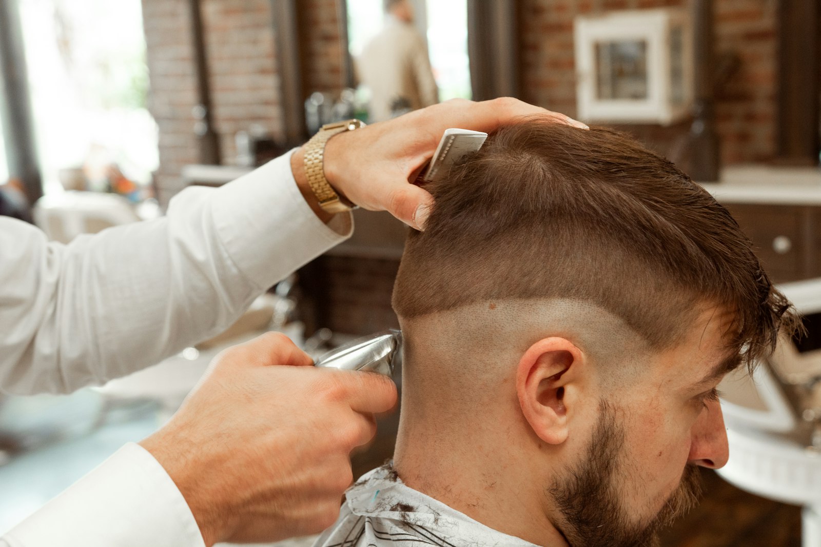 Skin fade with hard part